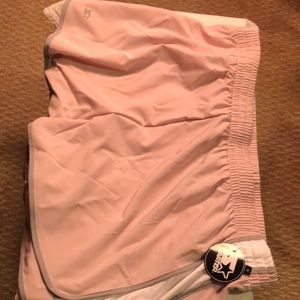 Starter Womens shorts, size XL, new with tags on. Pretty in pink!